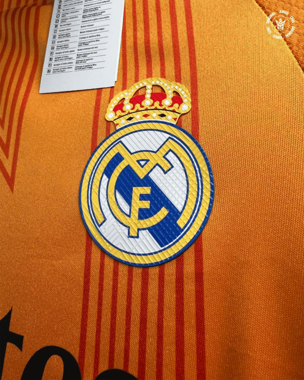maillot-exterieur-real-madrid-2025-orange-adidas
